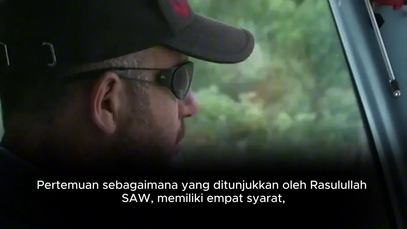 Video frame with Indonesian subtitles