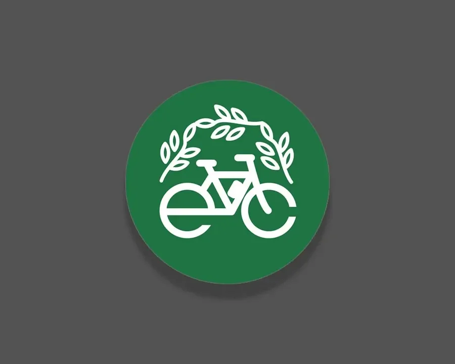 Greenbikes round green logo with a bicycle and laurel